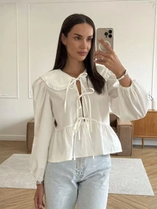 French style white cotton blouse with puff sleeves and tie-front ruffle collar