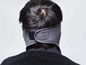 Detail of adjustable Velcro closure on thermal fleece winter face mask for outdoor cycling