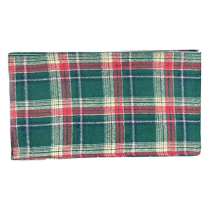 Classic green and red tartan patterned wrapping paper for Christmas floral gift packaging