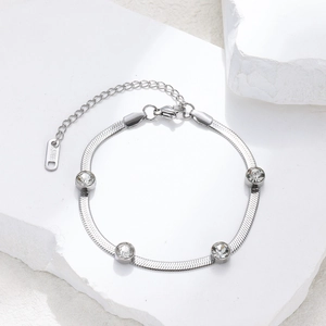 Sleek silver stainless steel snake chain bracelet featuring four round inlaid zircon stones