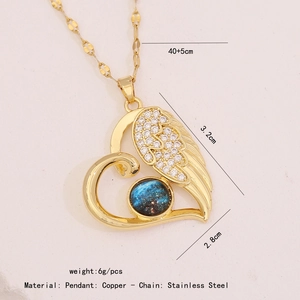 Detail of heart wing necklace showing dimensions 3.2x2.8cm and copper material