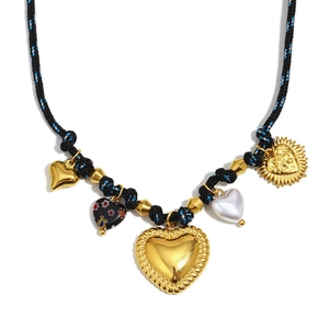 Vintage braided rope necklace with 18K gold plated heart charms and pearls on white base