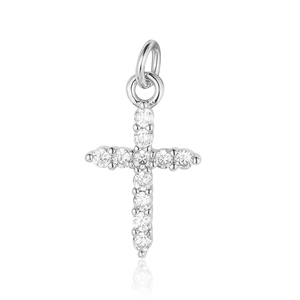 Detail of silver cross pendant featuring sparkling round cubic zirconia with top bail