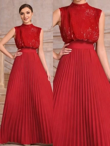 Detailed view of high-neck sequined bodice and pleated red maxi dress for women