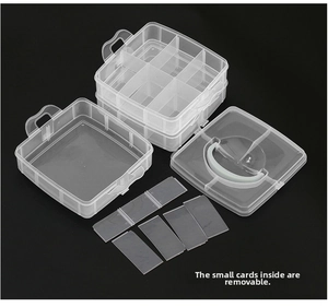 Detail showing removable internal dividers and handle of the plastic jewelry storage box