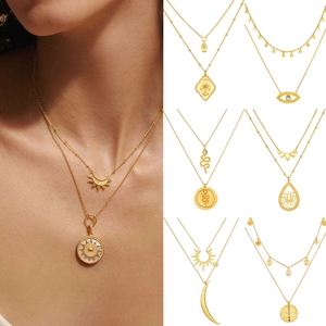 Bohemian layered 18k gold plated stainless steel necklaces with evil eye and sun charms