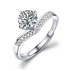 Detailed view of S925 sterling silver stamp on adjustable wavy band with Moissanite stones