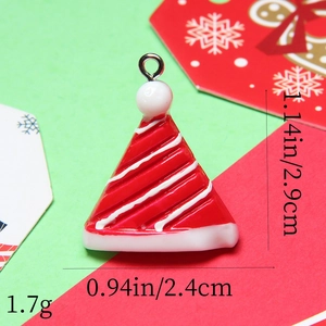 Detail view of a resin Christmas hat pendant with dimensions 2.9cm by 2.4cm and weight 1.7g