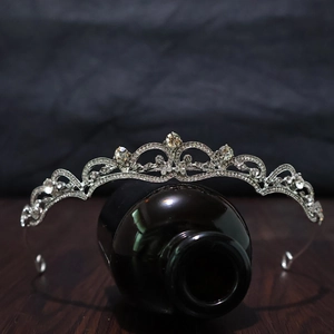 Elegant silver bridal crown with sparkling rhinestones for weddings and performances