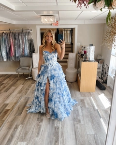 Detail of blue and white floral tube dress with boned bodice and high side slit