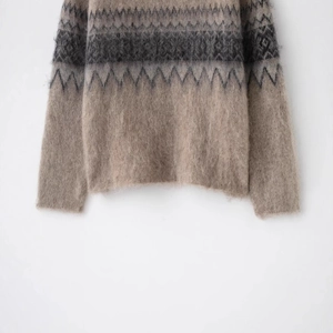 Fuzzy mohair knit sweater featuring ethnic geometric patterns and gradient colors