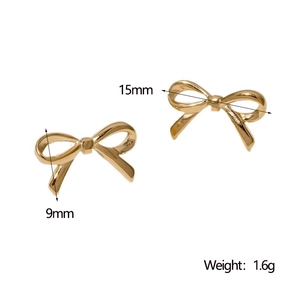 Detailed view of golden bow stud earrings showing dimensions 15mm width and 9mm height