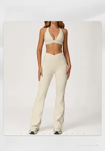 Detail of oatmeal yoga set featuring cross-waist flare pants and deep V-neck sports bra
