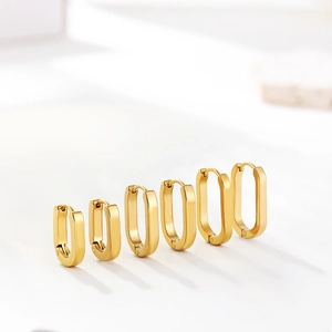 Detailed view of three sizes of geometric 18K gold plated oval hoop earrings set