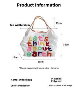 Detailed dimension guide for large white canvas tote bag with earth letter embroidery