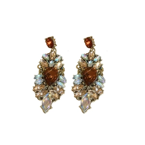 Baroque vintage drop earrings with amber and blue crystals on a gold setting