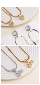 Detailed tile display of heart pendants and padlock necklaces in gold and silver finish