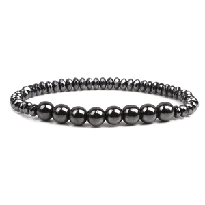 Faceted black stone beaded bracelet with sleek snake bone chain and polished round beads