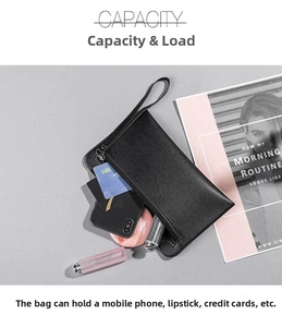 Black leather clutch bag showcasing large capacity for smartphone, lipsticks and cards