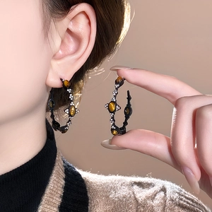 Vintage oval tiger eye C-shape hoop earrings with silver needles and crystal accents