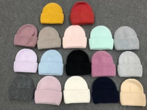Detailed palette showing 17 colors of thick ribbed knit rabbit fur beanie hats