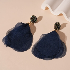 Elegant dark blue crystal bead and layered tulle petal fringe earrings on beige background