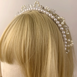 Detail of handcrafted bridal headband featuring pearls, crystal beads and golden wire