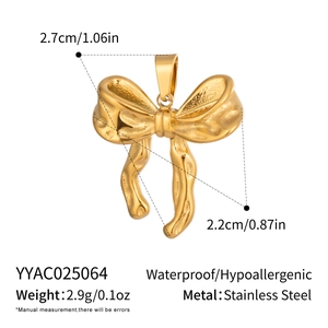 Detail view of 18K gold plated stainless steel bow pendant with dimensions and weight specs