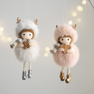Detailed view of plush angel ornaments with wooden reindeer antlers and striped scarves