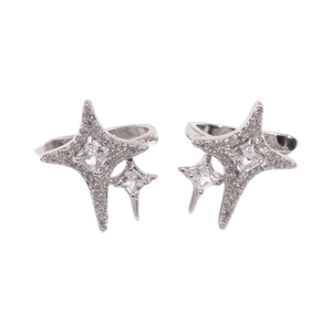 Sparkling silver star clip-on earrings with zircon stones on a white background