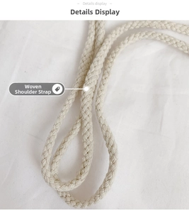 Detail showing the thick multi-strand woven shoulder strap for the rabbit coin purse