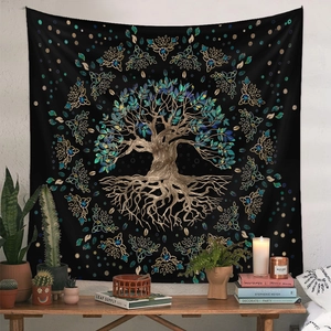 Detail of bohemian life tree tapestry with gold celtic knots on a black background