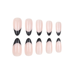 French tip press-on nails with black goth design and white spider web patterns