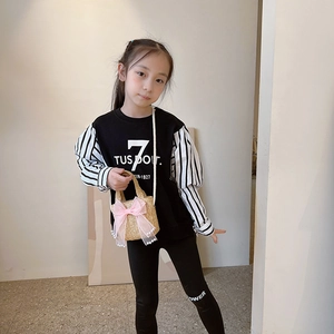 Cute kids straw crossbody bag with pink bow and pearls paired with striped sweatshirt