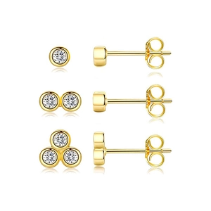 Detailed view of three gold S925 silver stud earrings with sparkling white zircons