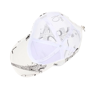 Detail view of the white baseball cap interior showing polyester fabric and Eiffel Tower print