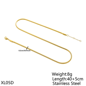 Macro detail of a 0.2cm gold plated stainless steel snake chain with lobster clasp