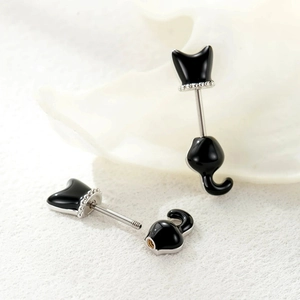 Creative black cat stud earrings in silver steel with a unique two-part split design