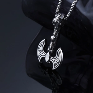 Punk style viking battle axe necklace with skull detail in silver stainless steel