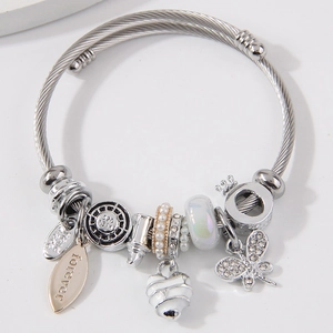 Silver beaded bracelet featuring butterfly heart charms and forever engraved leaf pendant