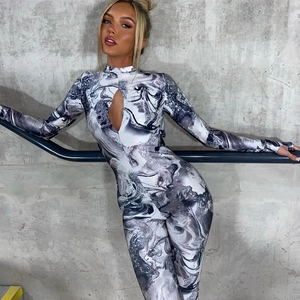 Chic long sleeve bodysuit with marble print and cutout detail in a slim fit style