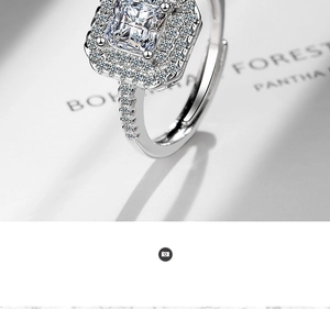 Macro view of silver square zircon ring featuring double halo and pave diamond band