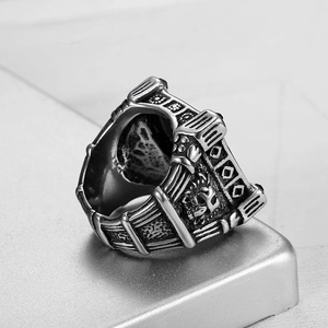 Close-up of vintage lion head relief ring with oxidized silver finish and punk style