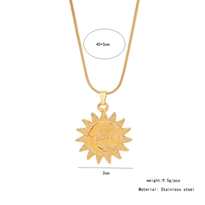 Detailed view of 2cm sun and moon pendant on golden stainless steel snake chain necklace
