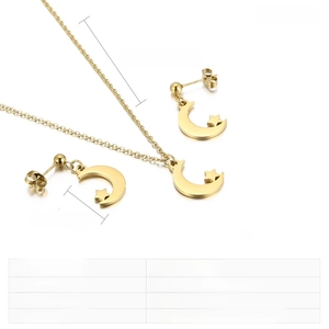 Detail view of stainless steel moon and star necklace with exact size measurements