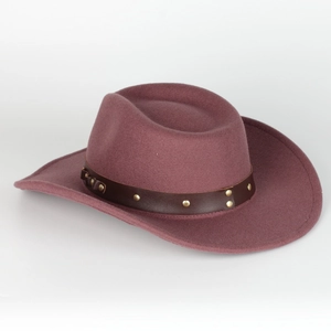 Close-up of dusty rose wool fedora featuring a brown faux leather band with gold studs