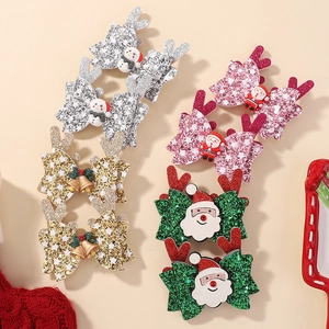 Glitter Christmas hair clips set with reindeer ears and festive sequins for girls