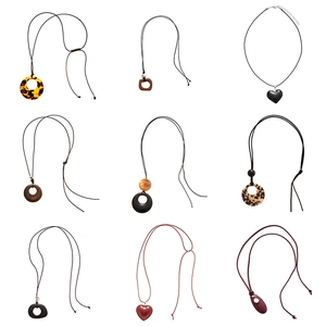 Set of 9 vintage acrylic geometric heart long necklaces with resin tortoiseshell pendants