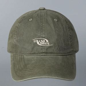 Detail view of washed cotton baseball cap in army green with white COLLSBORATE logo