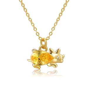 Detail of 18K gold-plated dinosaur necklace with a sparkling pear-shaped yellow gem